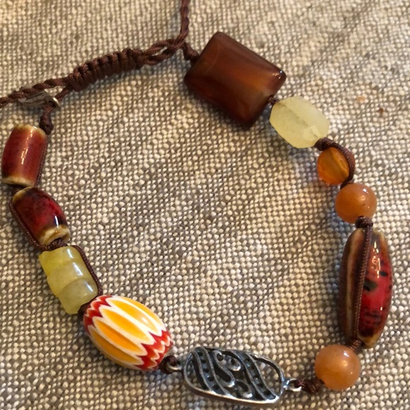 Silpada | Jewelry | Silpada Brown And Yellow Beaded Bracelet  Silpada Brown and Yellow Beaded Bracelet with Adjustable Cord.